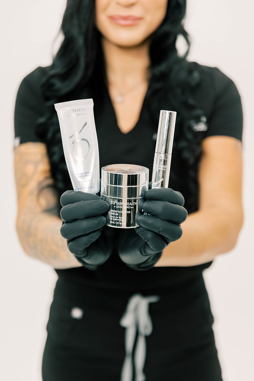 Photo of employee holding products